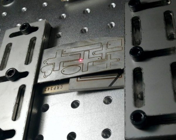 Laser cutting silver plate Laser cutting silver plate